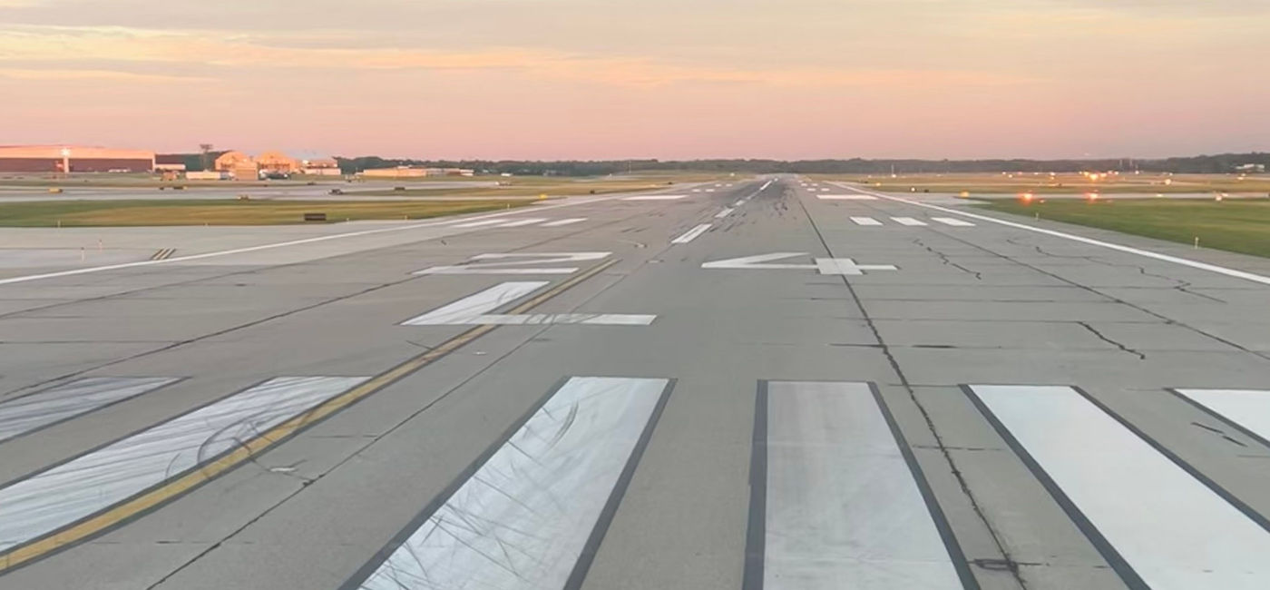 Image: Airport runway at sunrise. (Photo Credit: Photo by Paul J. Heney.)