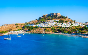 Lindos Acropolis and beach, Rhodes, Greece.
