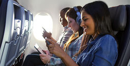 American Airlines customers stream onboard entertainment in the skies.