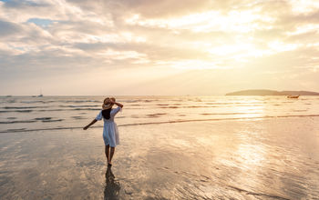 Summer traveler enjoying the beach