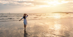 Summer traveler enjoying the beach