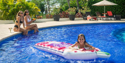 Family enjoying the pool at Wyndham Alltra Vallarta