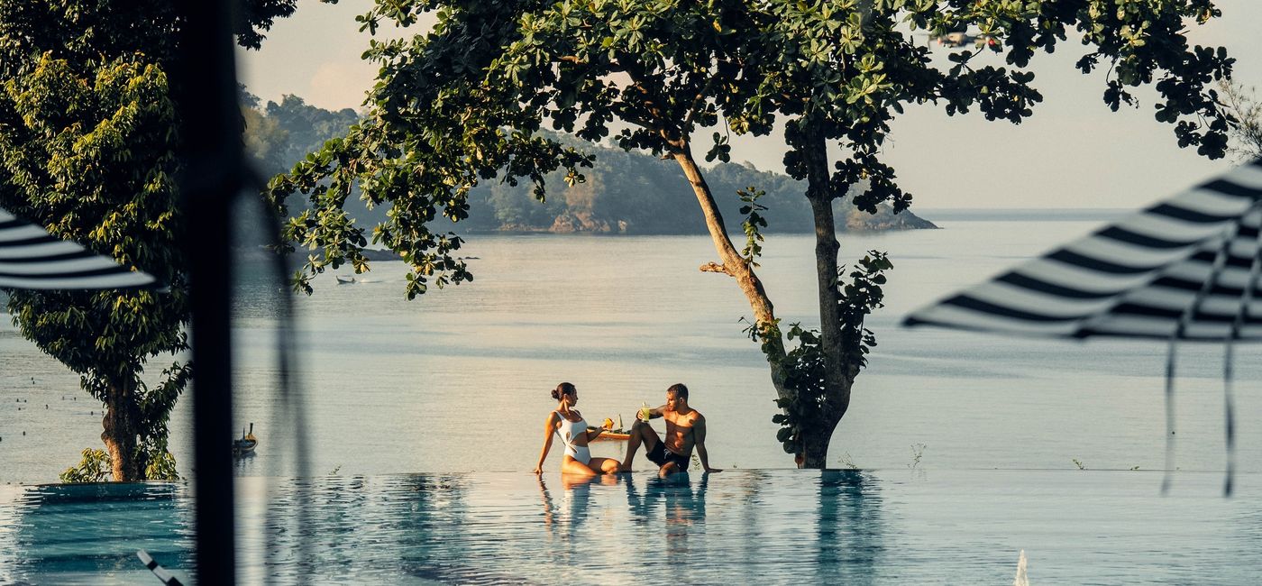 Image: Couple in pool at Accor's Pullman Phuket, Thailand. (Photo Credit: Accor)