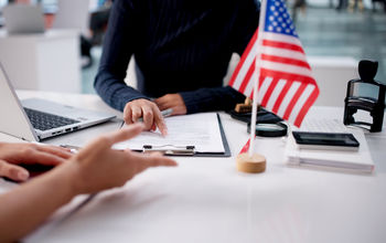 Woman interviewing for a US visa application