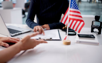 Woman interviewing for a US visa application