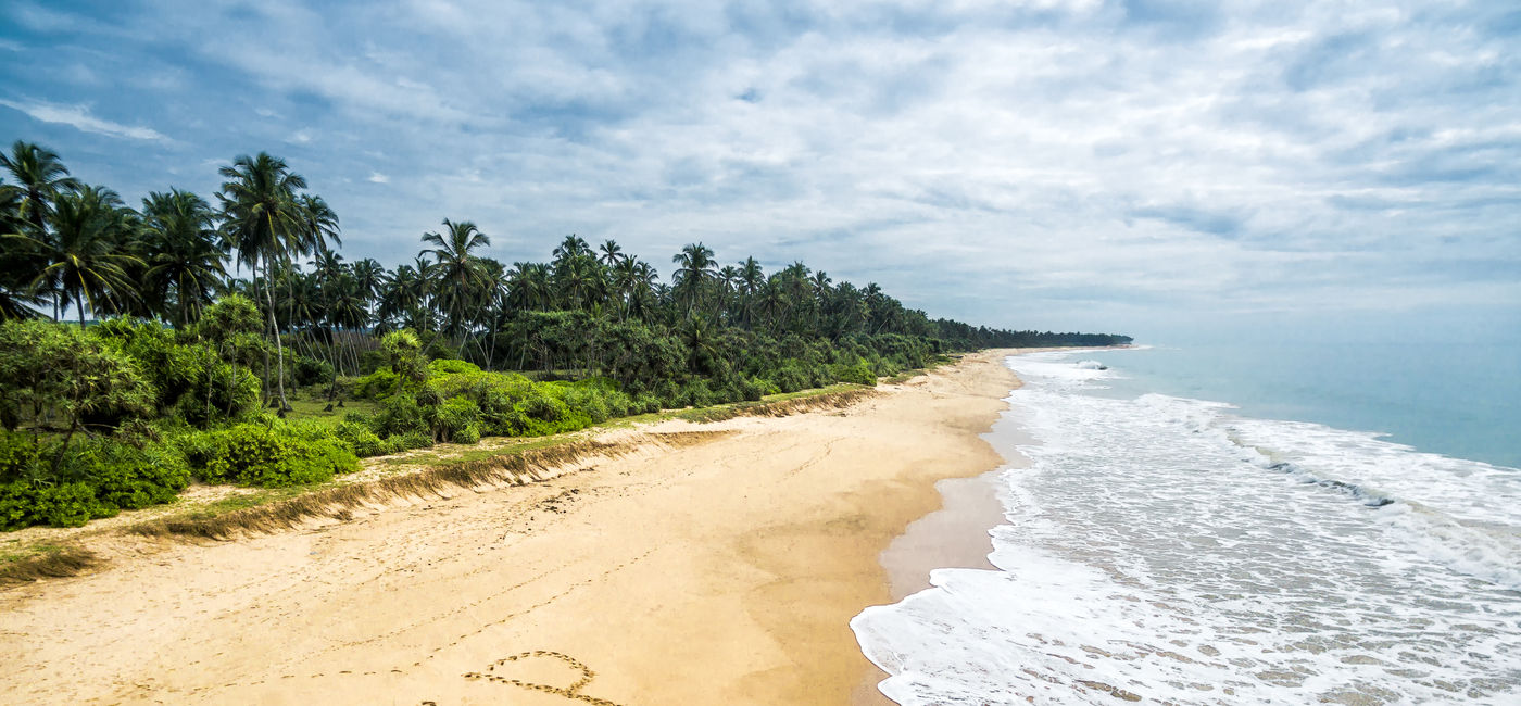 Image: The message 'Help' written on the sands of a tropical beach. (photo via iStock/Getty Images Plus/scaliger)