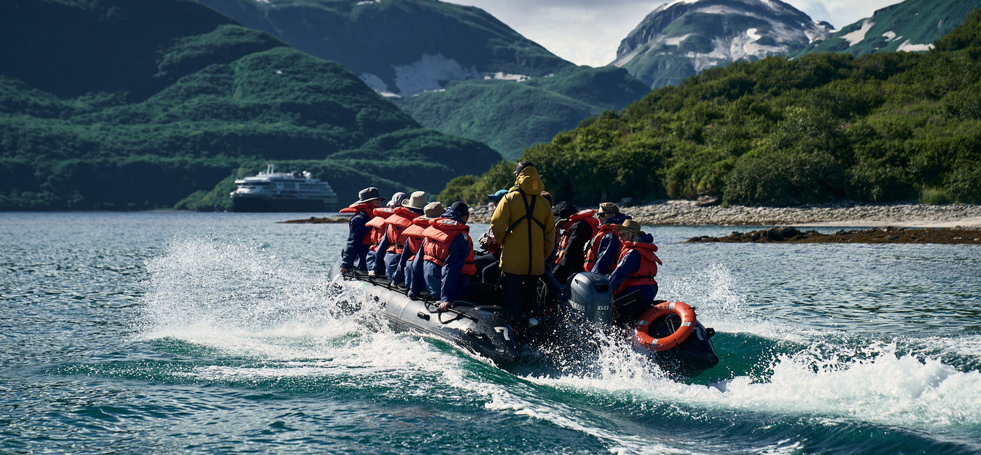 Image: Travelers Zodiac around Katmai National Park in Alaska. (Photo Credit: HX Expeditions)
