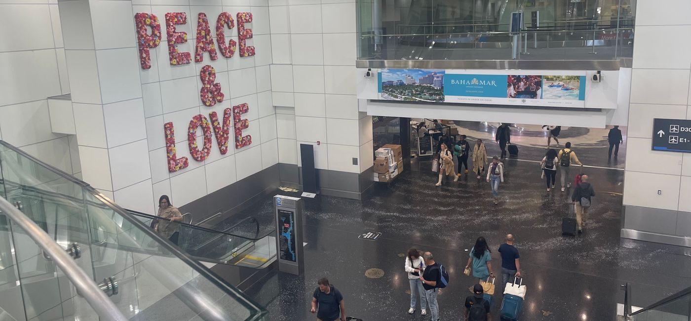 Image: Travelers passing through Miami International Airport. (photo by Patrick Clarke)