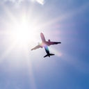 Plane flying through clouds.