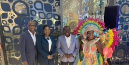 Bahamas Tourism leaders with DPM Chester Cooper and Junkanoo dancer