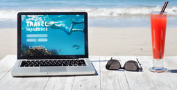 Shopping for travel insurance on a tropical beach.