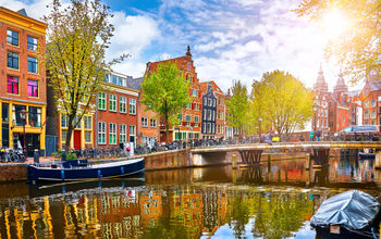Historic buildings and canal in Amsterdam's historic center.