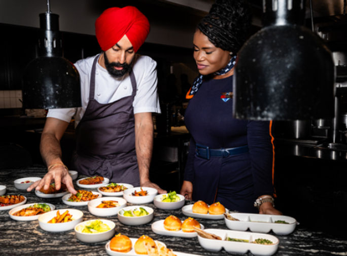 Crown Shy's Executive Chef Jassimran Singh with JetBlue crewmember Crown Shy's Executive Chef Jassimran Singh with JetBlue crewmember