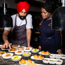 Crown Shy's Executive Chef Jassimran Singh with JetBlue crewmember