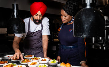 Crown Shy's Executive Chef Jassimran Singh with JetBlue crewmember