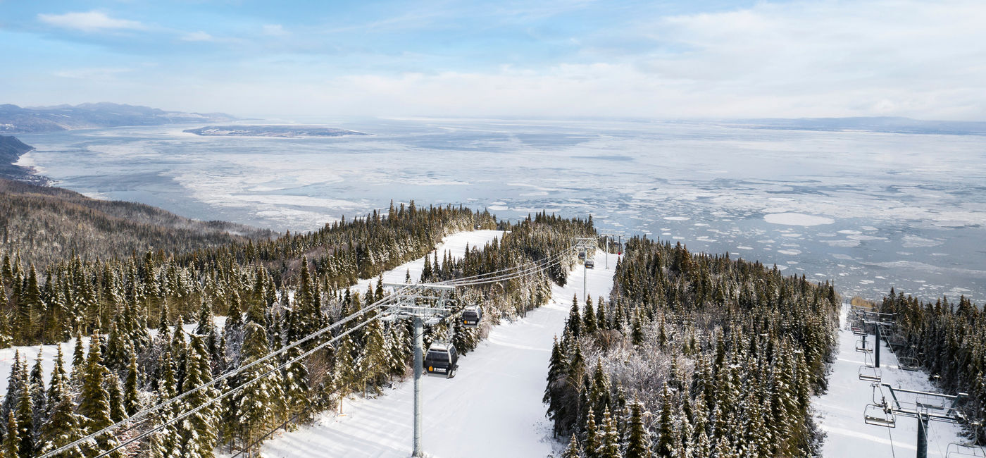 Image: The ski trails in Charlevoix provide beautiful views of the St. Lawrence River. (Source: Club Med)