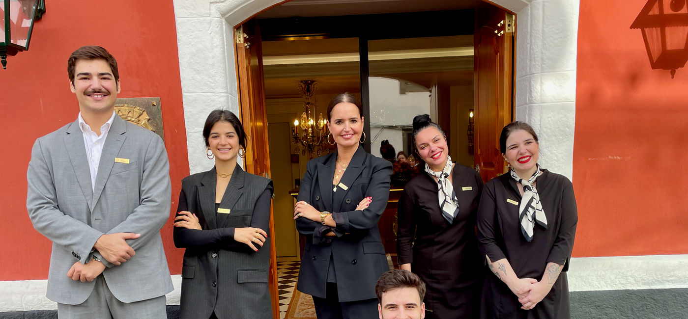 Image: The welcoming staff at the Boutique Hotel Teatro on the Azorean island of Terceira. General Manager Diogo Evangelho is at left. His mother Claudia is in the centre. (Photo Credit: Bruce Parkinson)