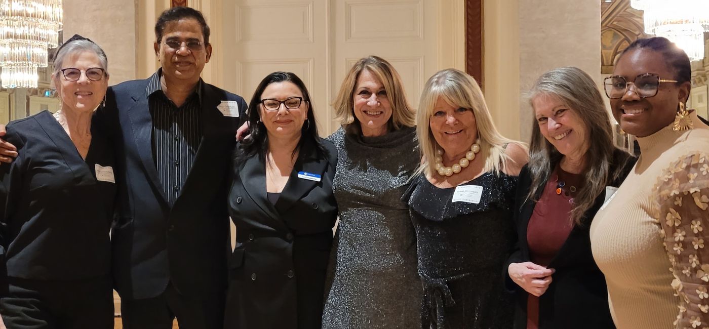 Image: From Direct Travel’s Toronto office, left to right: Adie Schlossberg, Rajiv Calpakam, Lucy Catalanotto, grand prize winner Tina Ngotzamanis,  Isobel Mickiewicz,  Lisa Booth and Nadian Powell