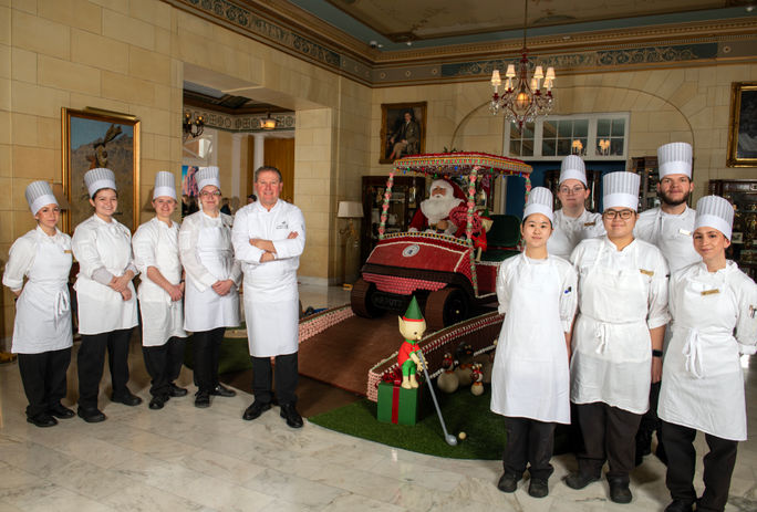 More than 42 bakers helped bring the golf cart scene to life More than 42 bakers helped bring the golf cart scene to life