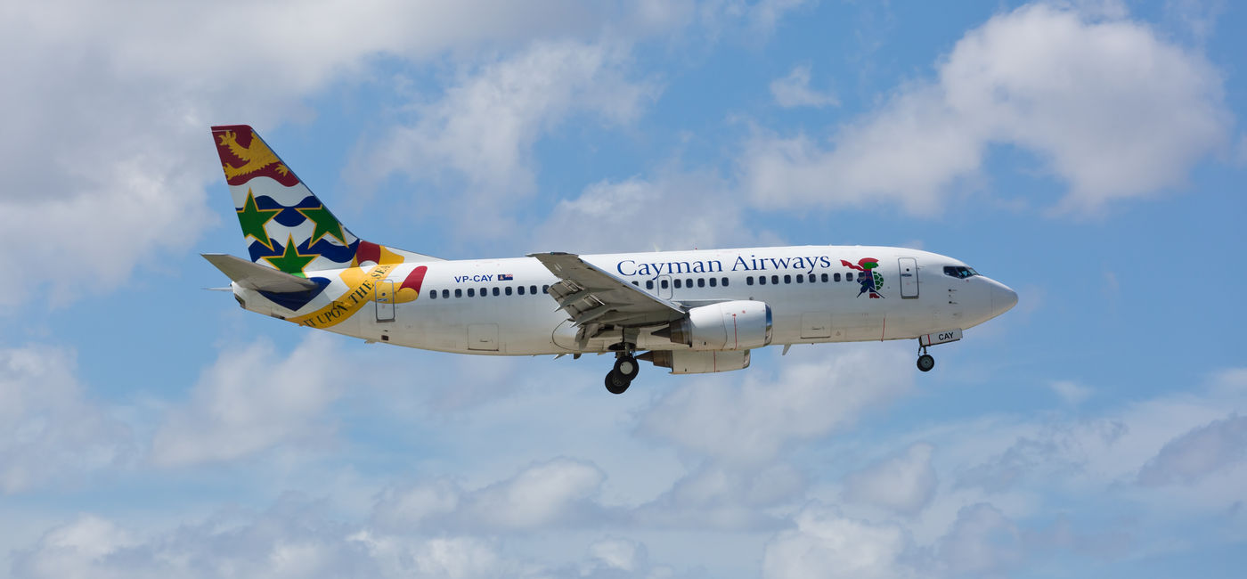 Image: Cayman Airways Boeing 737. (Photo Credit: Adobe/Carlos Yudica)