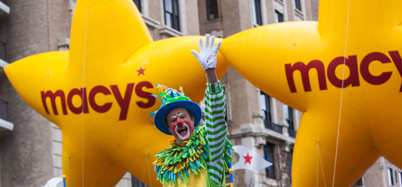 Image: Macy's Thanksgiving Day Parade clown and balloons on the streets of New York City. (photo via Flickr/Anthony Quintano)