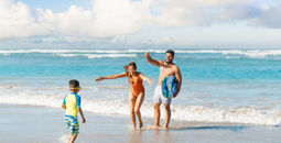 Families enjoy fun and games at the beach at Wyndham Alltra Punta Cana.
