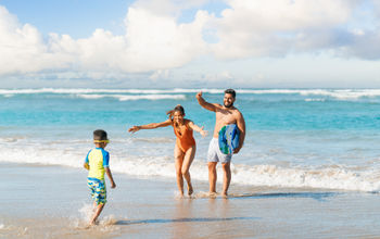 Families enjoy fun and games at the beach at Wyndham Alltra Punta Cana.