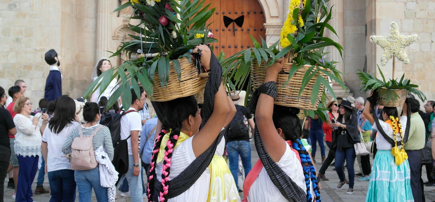 Image: A calenda in Oaxaca (Photo Credit: Photo by Beca Pérez on Unsplash)