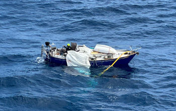 The man's sailboat was disabled by gale-force winds and 30-foot seats