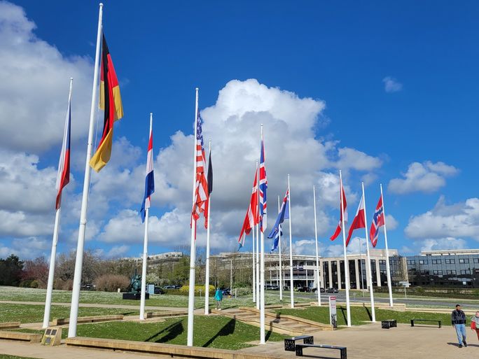 The flags of participating countries in WWII outside the Caen Memorial Museum in Caen, Normandy, France. Lacey Pfalz, caen, normandy, normandy attractions, flags, seine river cruise, D-Day, WWII memorials
