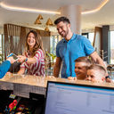 Family checking into hotel