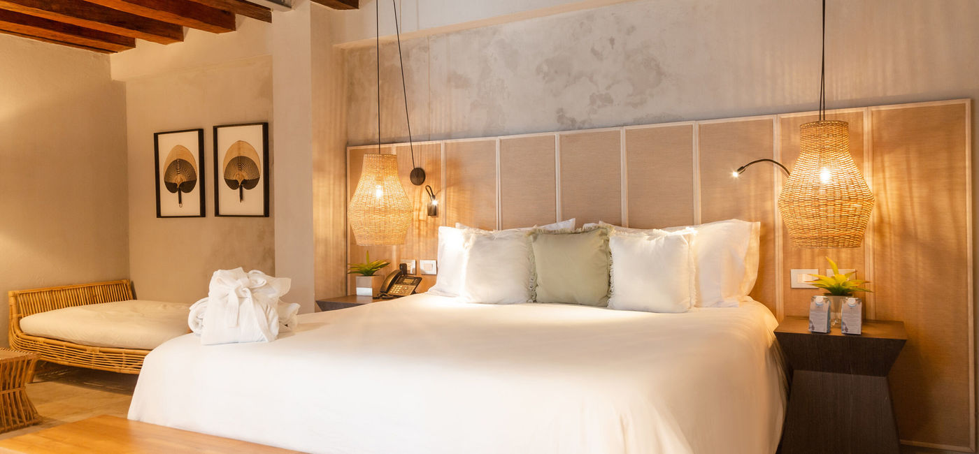 Image: A guestroom inside the Hotel Casa Don Luis, a Radisson Individuals property in Cartagena. (Photo Credit: Choice Hotels International, Inc.)