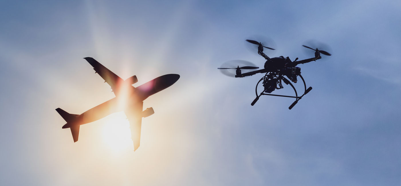 Image: A drone illegally flying near an airport. (Photo Credit: toa555 / AdobeStock)