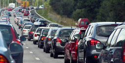 Traffic jam with rows of cars.