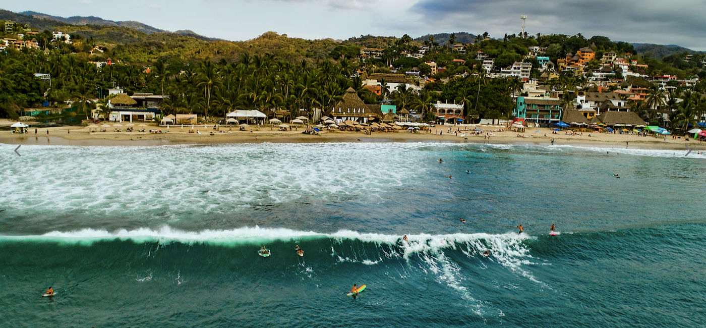 Image: Surfers from all over the world gather in the Magic Town of Sayulita to enjoy world-class waves. (Photo Credit: Ministry of Tourism of Nayarit)