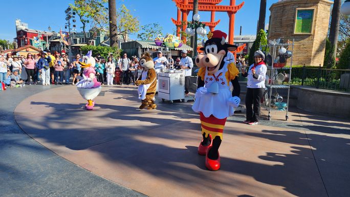 Daisy Duck, Clarabelle Cow and Chip 'n' Dale dance during the "Cookin' With the Jammin' Chefs" street show at Disney California Adventure park.