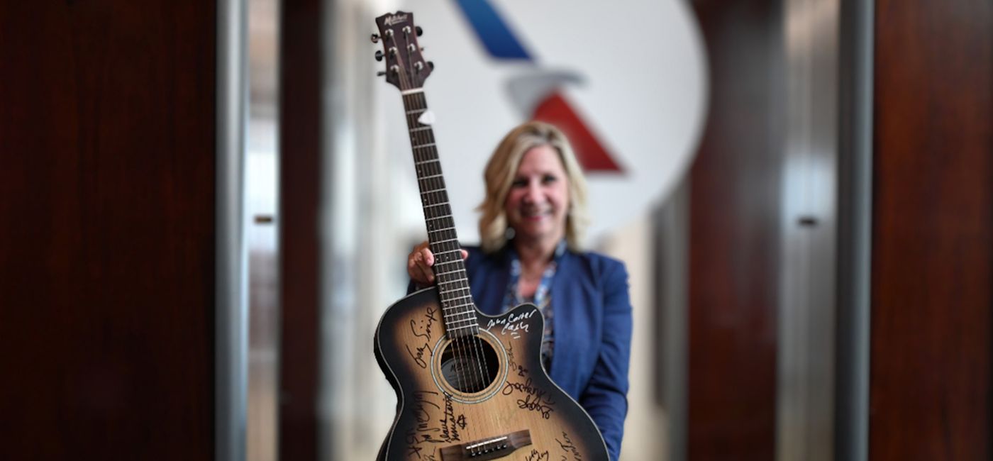 Image: The Admirable Club's signature celebrity guitar. (Source: American Airlines)