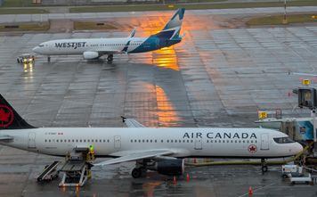 Air Canada WestJet on the tarmac