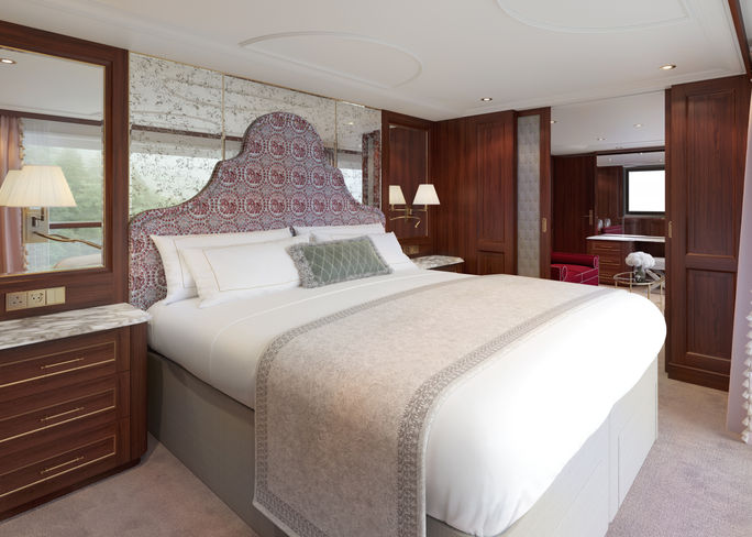 A rendering of a Grand Suite bedroom aboard S.S. Clara