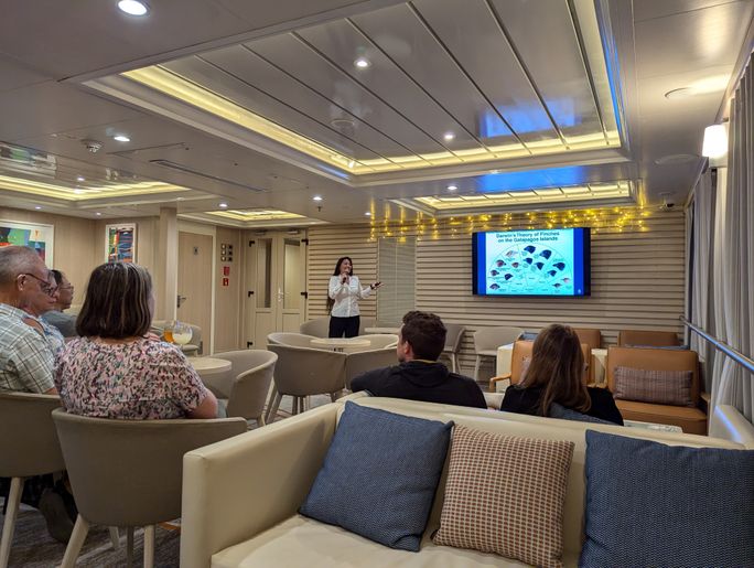 Onboard naturalist guides give "tiny talk" lectures each evening in the Panorama Bar & Lounge