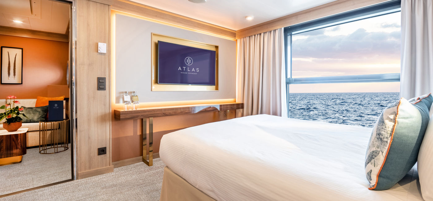 Image: Atlas Ocean Voyages' Concierge Collection Deluxe Horizon suite. (Photo Credit: Atlas Ocean Voyages)