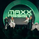 From left, Brian Shultz, CIO; Michelle Fee, founder and CEO; Scott Koepf, chief strategy officer; and Theresa Scalzitti, COO of Cruise Planners, introduce Maxx Assist at CP World 2026