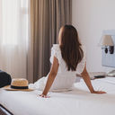 Traveler in hotel room