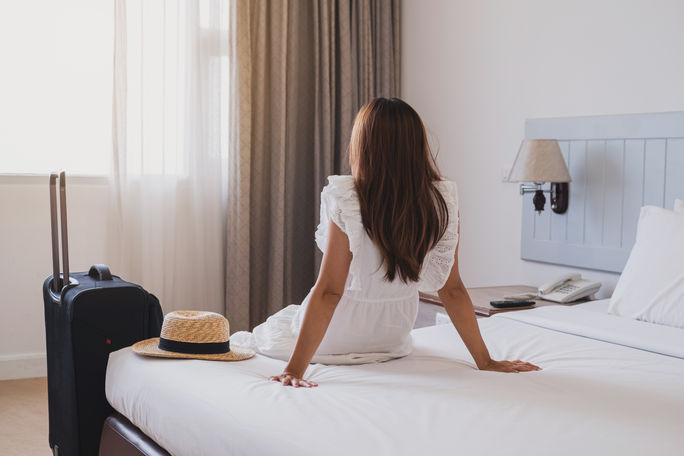 Traveler in a hotel room