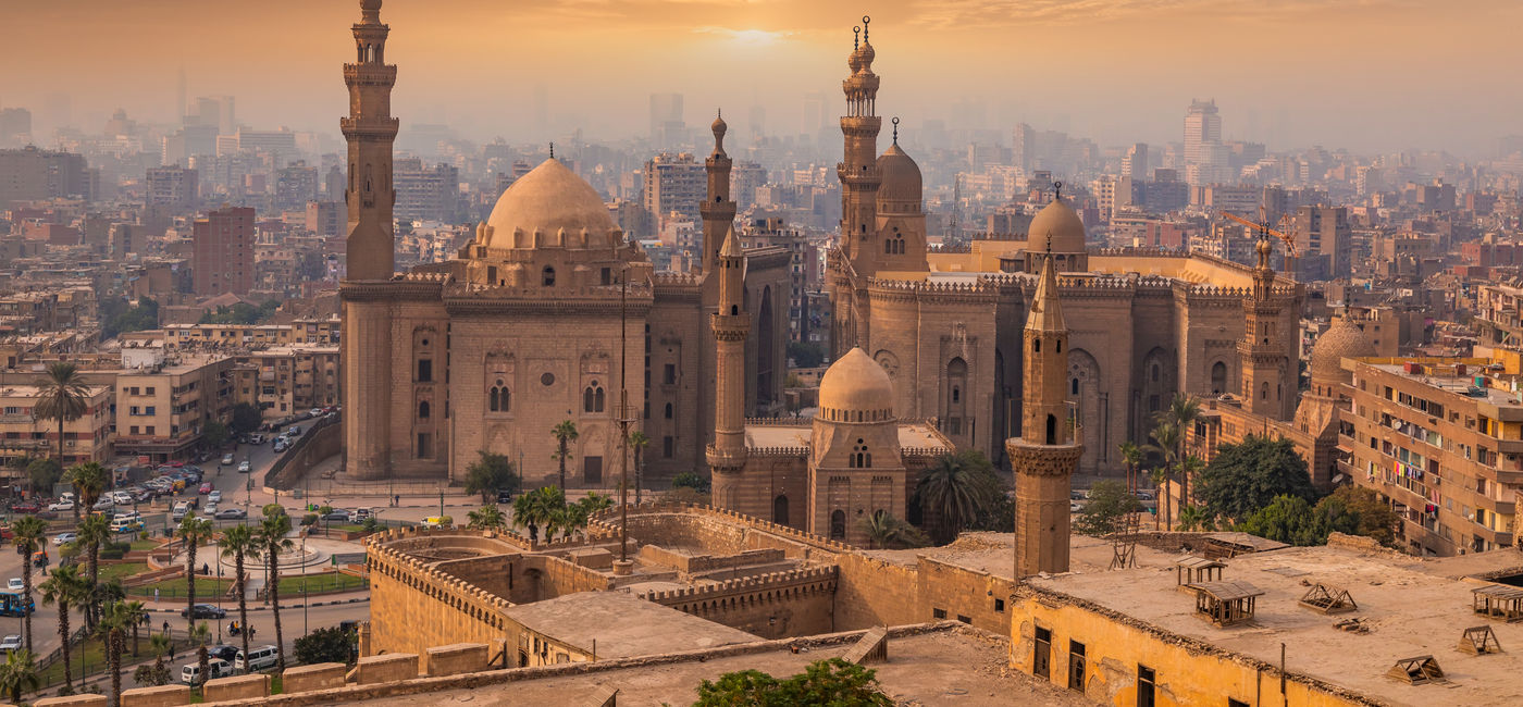 Image: The Mosque-Madrasa of Sultan Hassan at sunset, Cairo Citadel, Egypt. (Photo Credit: Anton Petrus / Adobe Stock)