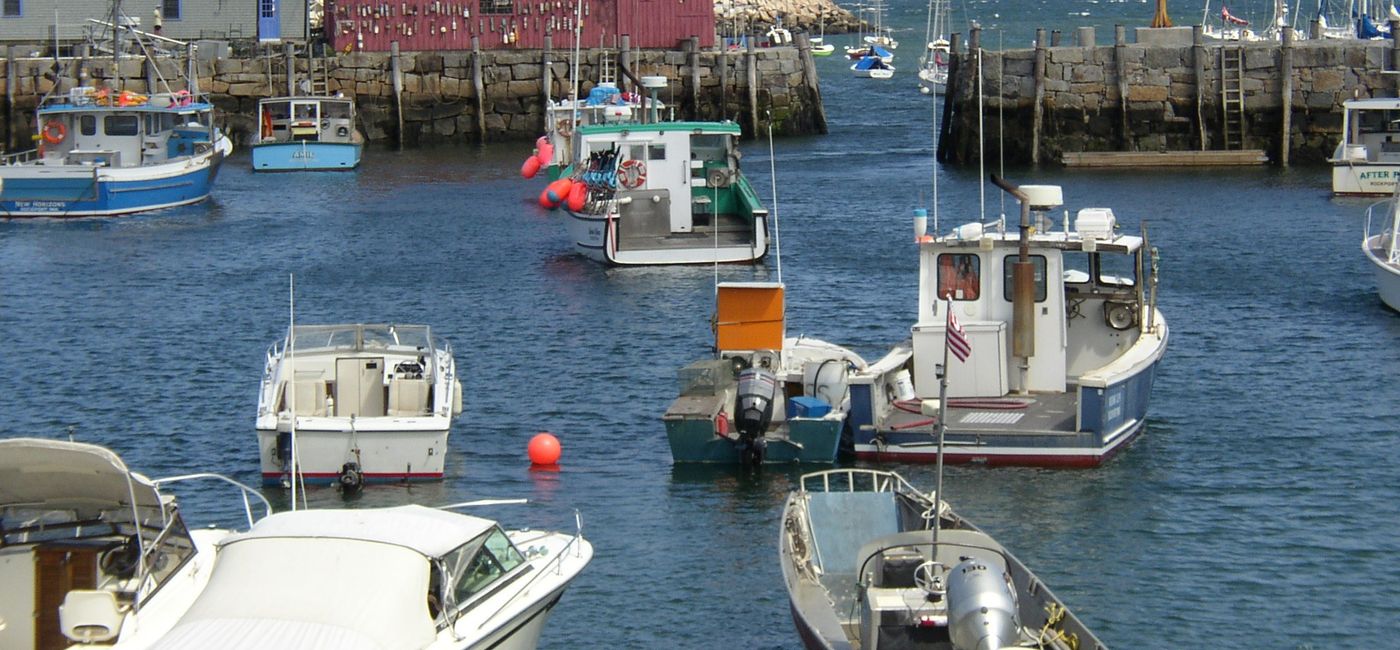 Image: The handsome harbor of Rockport, Massachusetts. (Photo via Williamborg / Wikimedia Commons)