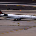 Air Canada Jazz Bombardier CRJ900 C-GJZS landing on runway 26 at Phoenix Sky Harbor Intl. Airport.