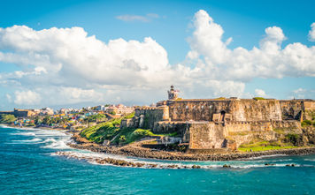 Panoramic landscape of historical castle El Morro along the coastline, San Juan, Puerto Rico.