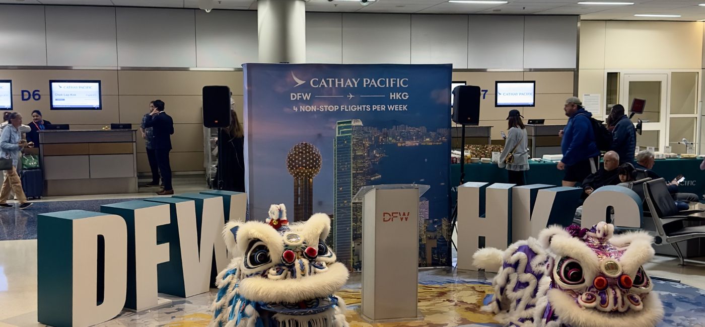 Image: At the departure gate, where a traditional Lion Dance was performed to commemorate the service. (Photo Credit: Scott Laird)