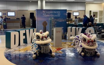 At the departure gate, where a traditional Lion Dance was performed to commemorate the service.